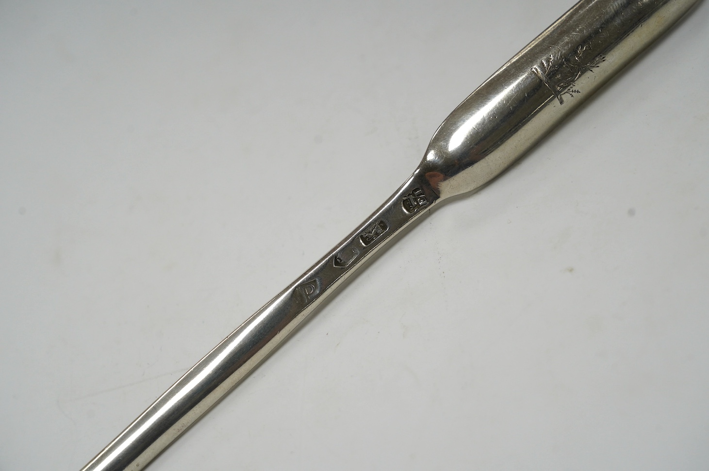 A George II silver marrow scoop, by Edward Jennings, London, 1730, 21.6cm, 50 grams. Condition - fair
